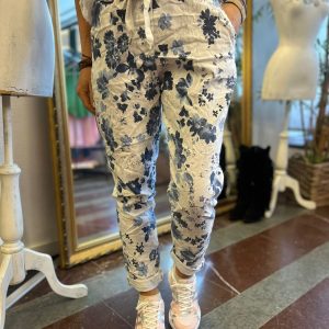 Stretchiga byxor med blommor och knyt – Blå