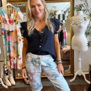 Långa shorts i superstretch med blommönster – Ljusblå